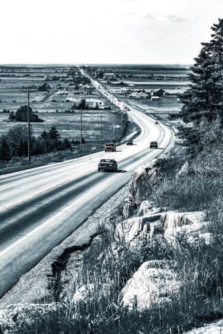 B&W Canadian Country Road - Just Colorful Stock Photos and Animations for all your Projects.